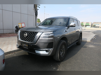 Nissan  Patrol  Platinum  2011  Automatic  48,000 Km  8 Cylinder  Four Wheel Drive (4WD)  SUV  Gray
