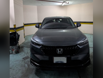 Honda  HRV  2024  Automatic  22,000 Km  4 Cylinder  Front Wheel Drive (FWD)  SUV  Blue and Gray  With Warranty