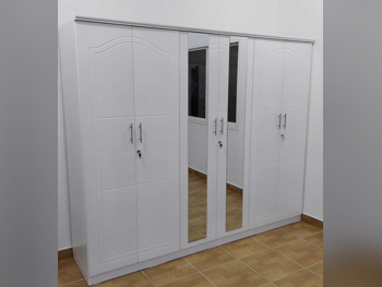 خزائن ودواليب الملابس والزينة - دوحة فيرنيتشر - خزائن - أبيض