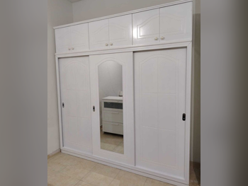 خزائن ودواليب الملابس والزينة - دوحة فيرنيتشر - خزائن - أبيض