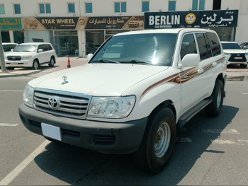 Toyota  Land Cruiser  GX  2004  Automatic  445,000 Km  6 Cylinder  Four Wheel Drive (4WD)  SUV  White