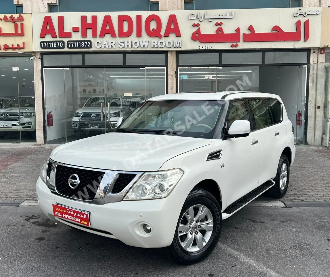 نيسان باترول اس اي 2012 اوتوماتيك 249,000 كم 8 سلندر دفع رباعي اس يو في أبيض