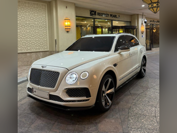 Bentley  Bentayga  2017  Automatic  99,000 Km  12 Cylinder  Four Wheel Drive (4WD)  SUV  White