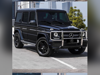 Mercedes-Benz  G-Class  63 AMG  2014  Automatic  115,000 Km  8 Cylinder  Four Wheel Drive (4WD)  SUV  Black  With Warranty