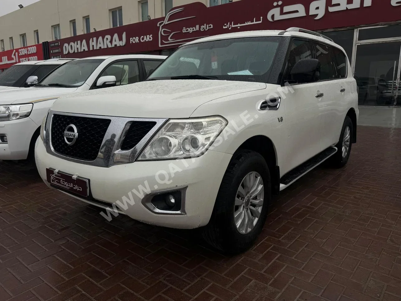 نيسان باترول أكس أي 2014 اوتوماتيك 249,000 كم 6 سلندر دفع رباعي اس يو في أبيض