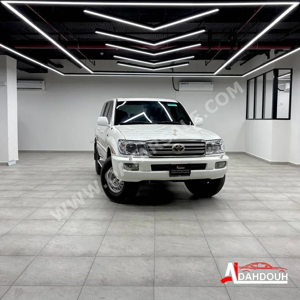 تويوتا  لاند كروزر  جي اكس ار  2006  عادي  312,000 كم  6 سلندر  دفع رباعي  اس يو في  أبيض