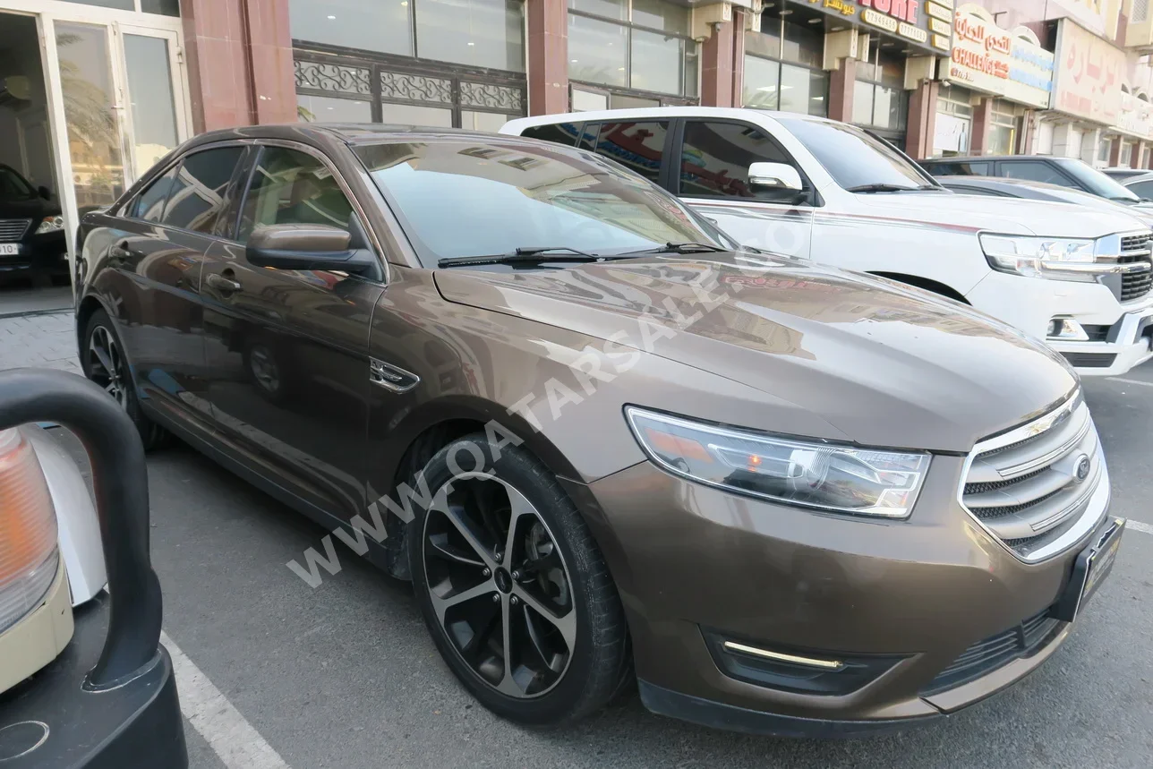 فورد تورس 2016 اوتوماتيك 117,000 كم 6 سلندر دفع خلفي سيدان بني