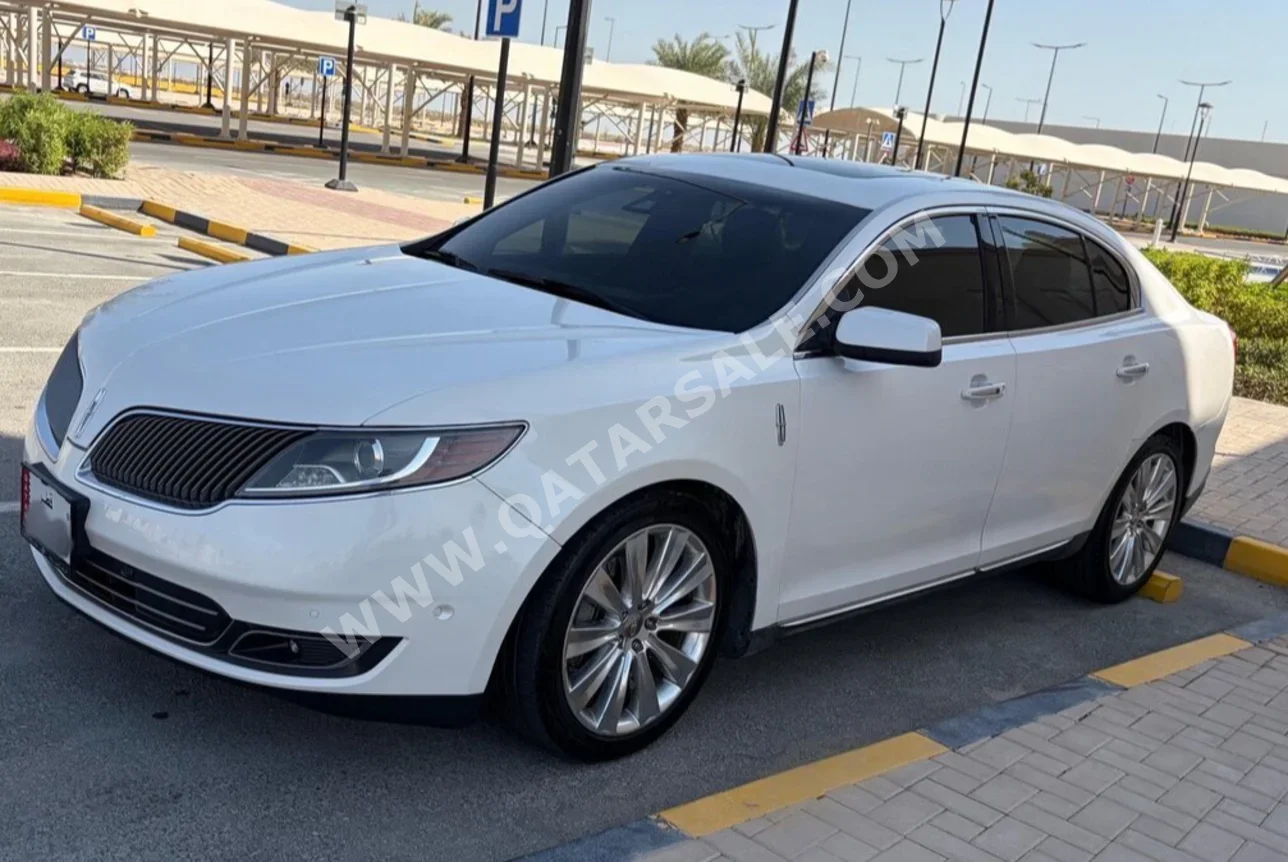Lincoln  MKS  2015  Automatic  116,000 Km  6 Cylinder  Rear Wheel Drive (RWD)  SUV  White