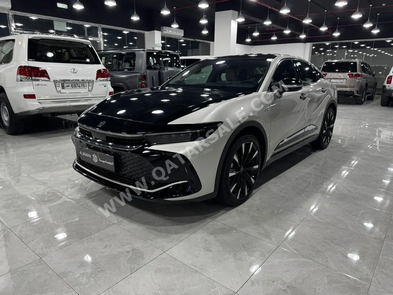 Toyota  Crown  Hybrid  2024  Automatic  9,000 Km  4 Cylinder  All Wheel Drive (AWD)  Sedan  Gray and Black  With Warranty