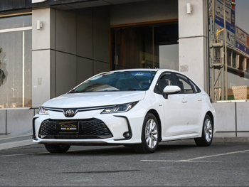 Toyota  Corolla  Hybrid  2025  Automatic  0 Km  4 Cylinder  Front Wheel Drive (FWD)  Sedan  White  With Warranty