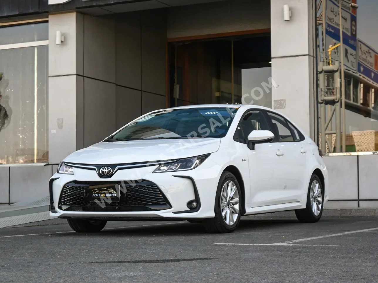 تويوتا  كورولا  هايبرد  2025  اوتوماتيك  0 كم  4 سلندر  سحب امامي  سيدان  أبيض