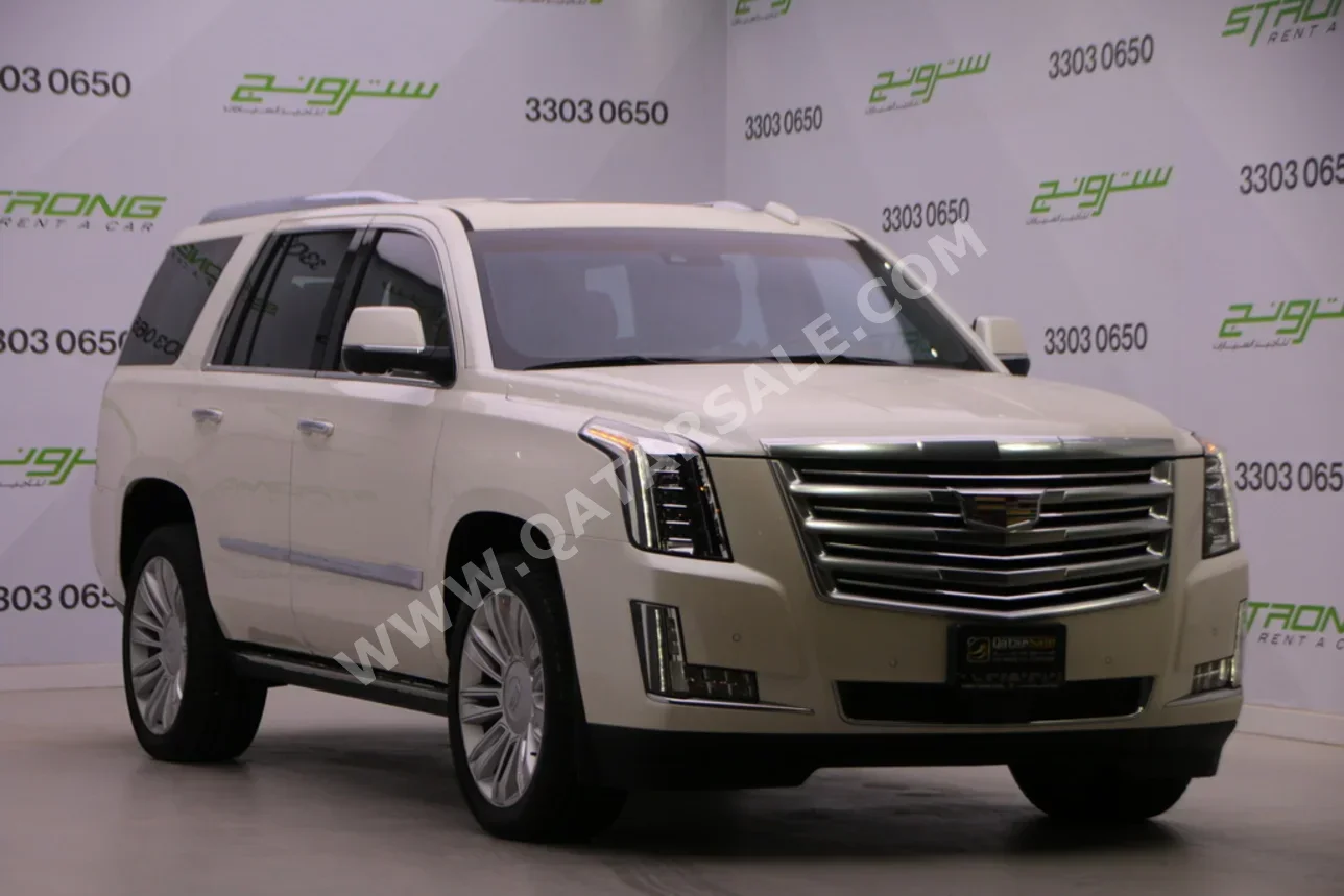 كاديلاك  اسكيليد  بلاتينيوم  2015  اوتوماتيك  132,000 كم  8 سلندر  دفع رباعي  اس يو في  أبيض لؤلؤي