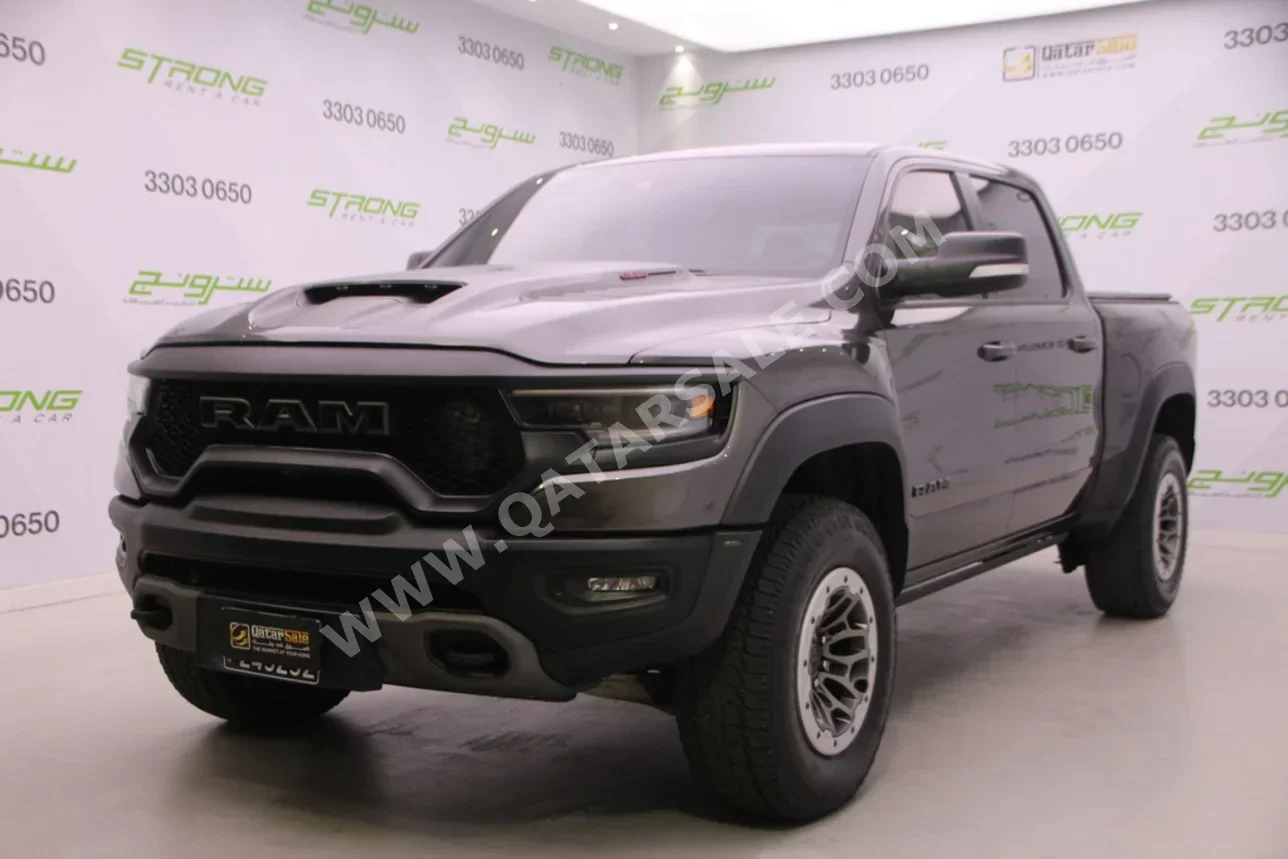 دودج  رام  تي أر إكس  2022  اوتوماتيك  60,574 كم  8 سلندر  دفع رباعي  بيكب  رمادي  تحت الضمان