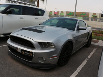 Ford  Mustang  GT  2014  Manual  171,000 Km  8 Cylinder  Rear Wheel Drive (RWD)  Coupe / Sport  Silver