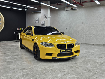 بي ام دبليو  الفئة - ام  5  2014  اوتوماتيك  172,000 كم  8 سلندر  دفع خلفي  سيدان  أصفر