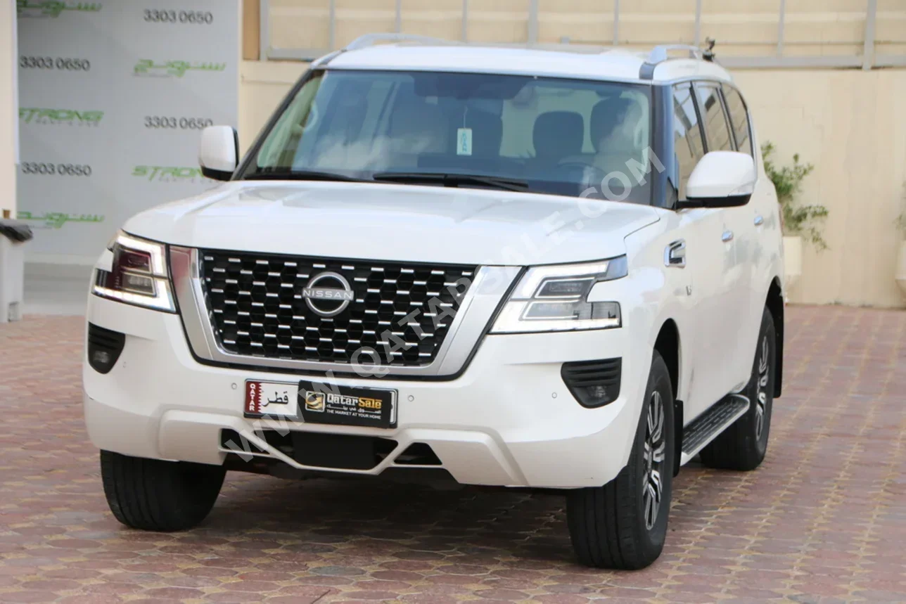 Nissan  Patrol  LE  2023  Automatic  157,000 Km  8 Cylinder  Four Wheel Drive (4WD)  SUV  White