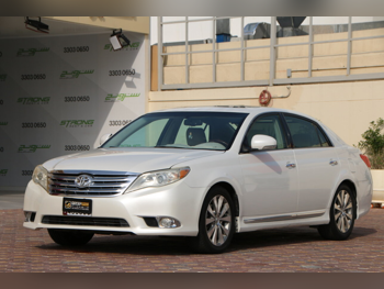 تويوتا  أفالون  لمتيد  2012  اوتوماتيك  298,000 كم  6 سلندر  سحب امامي  سيدان  أبيض