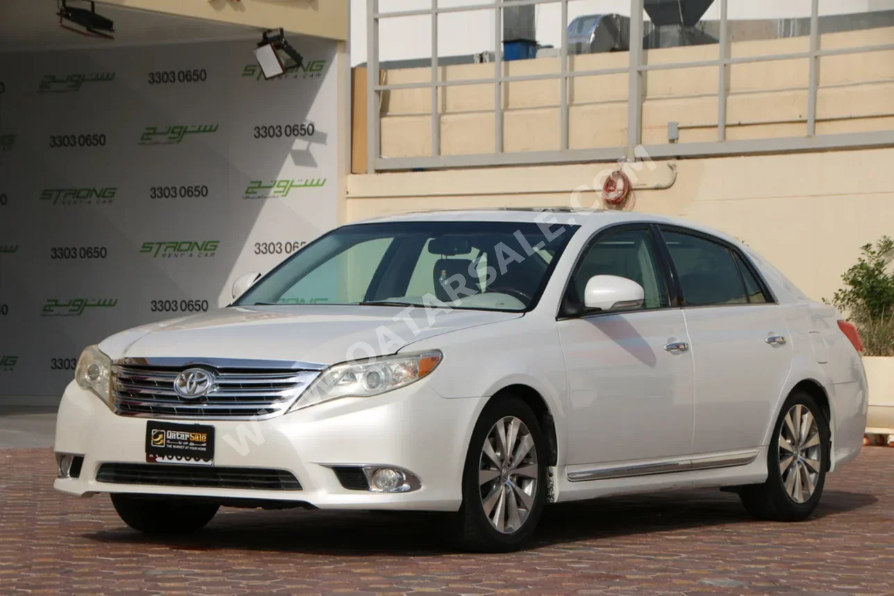 Toyota  Avalon  Limited  2012  Automatic  298,000 Km  6 Cylinder  Front Wheel Drive (FWD)  Sedan  White