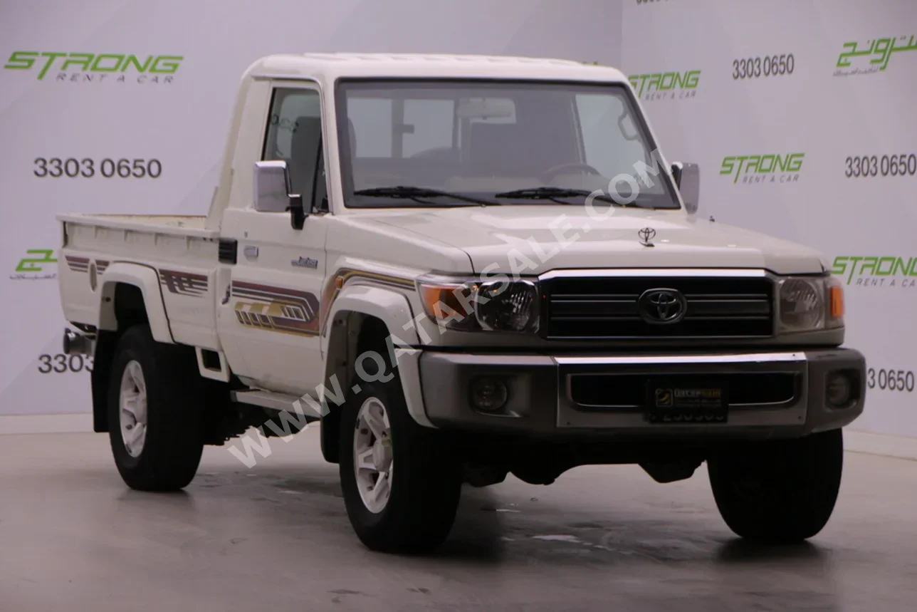 Toyota  Land Cruiser  LX  2022  Manual  90,000 Km  6 Cylinder  Four Wheel Drive (4WD)  Pick Up  White  With Warranty