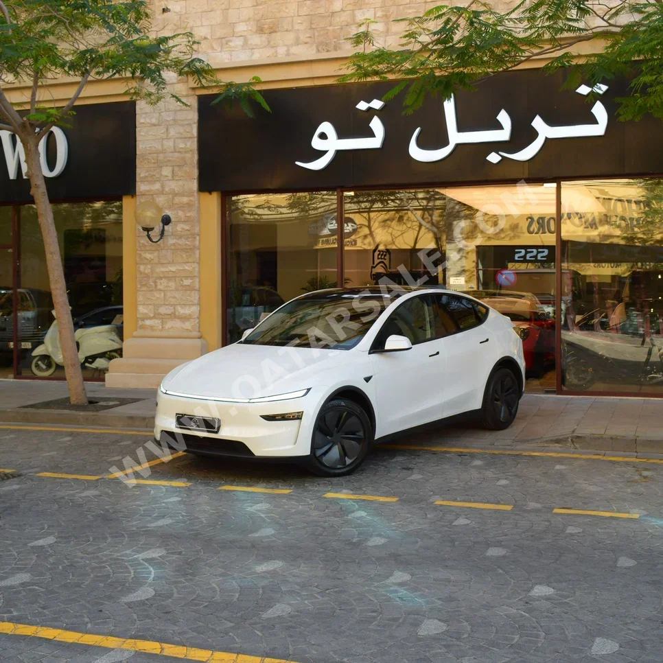 Tesla  Model Y  Long Range  2026  Automatic  490 Km  0 Cylinder  All Wheel Drive (AWD)  SUV  White  With Warranty