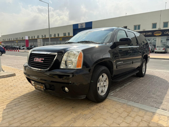 GMC  Yukon  XL  2014  Automatic  60,000 Km  8 Cylinder  Four Wheel Drive (4WD)  SUV  Black