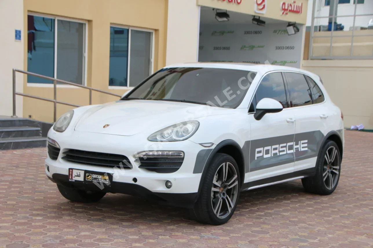 بورش  كيان  اس  2014  اوتوماتيك  195,000 كم  8 سلندر  دفع رباعي  اس يو في  أبيض