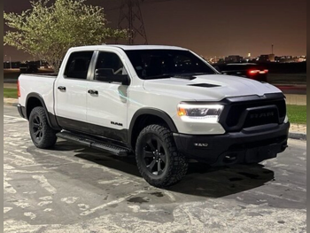 Dodge  Ram  Rebel  2023  Automatic  64,037 Km  8 Cylinder  Four Wheel Drive (4WD)  Pick Up  White  With Warranty