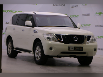 Nissan  Patrol  SE  2013  Automatic  278,000 Km  8 Cylinder  Four Wheel Drive (4WD)  SUV  White