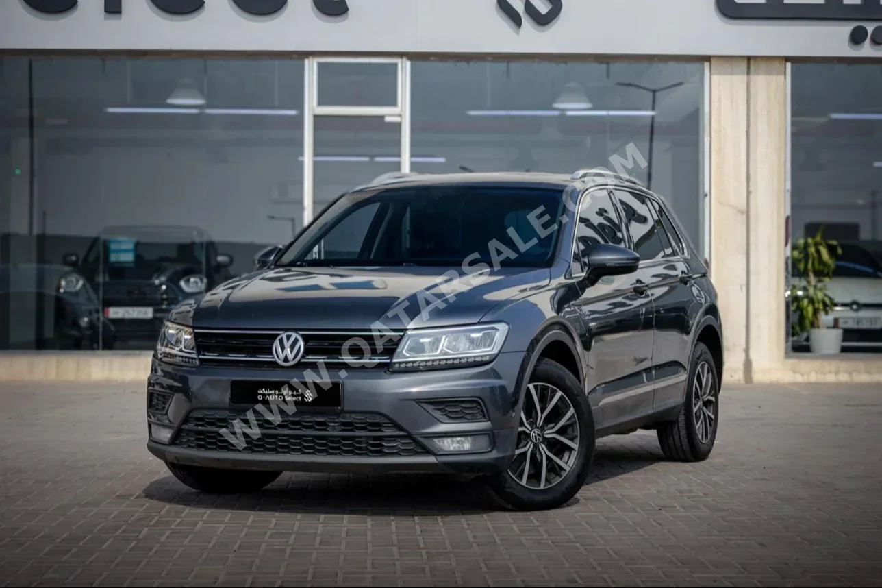 Volkswagen  Tiguan  2.0 TSI  2020  Automatic  90,000 Km  4 Cylinder  All Wheel Drive (AWD)  SUV  Gray