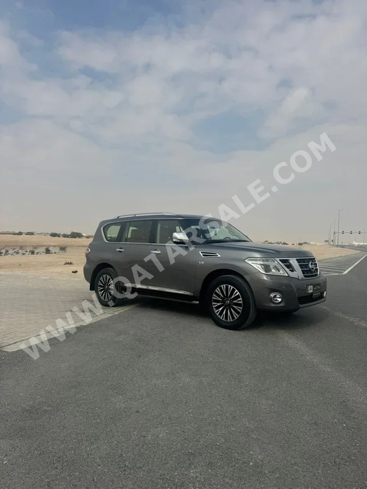 Nissan  Patrol  Platinum  2016  Automatic  371,000 Km  8 Cylinder  Four Wheel Drive (4WD)  SUV  Dark Gray