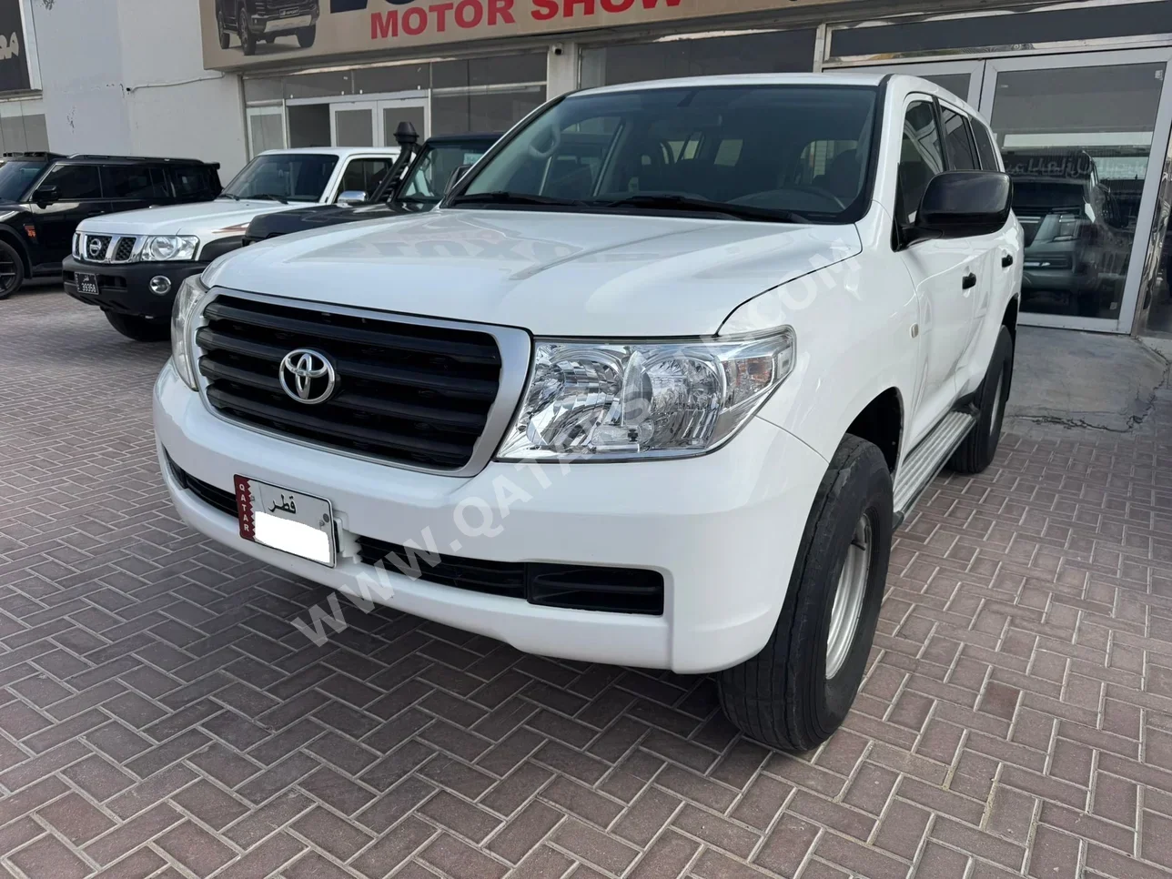 تويوتا  لاند كروزر  جي  2011  اوتوماتيك  360,000 كم  6 سلندر  دفع رباعي  اس يو في  أبيض
