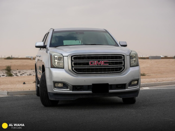 GMC  Yukon  SLE  2015  Automatic  115,853 Km  8 Cylinder  Four Wheel Drive (4WD)  SUV  Silver