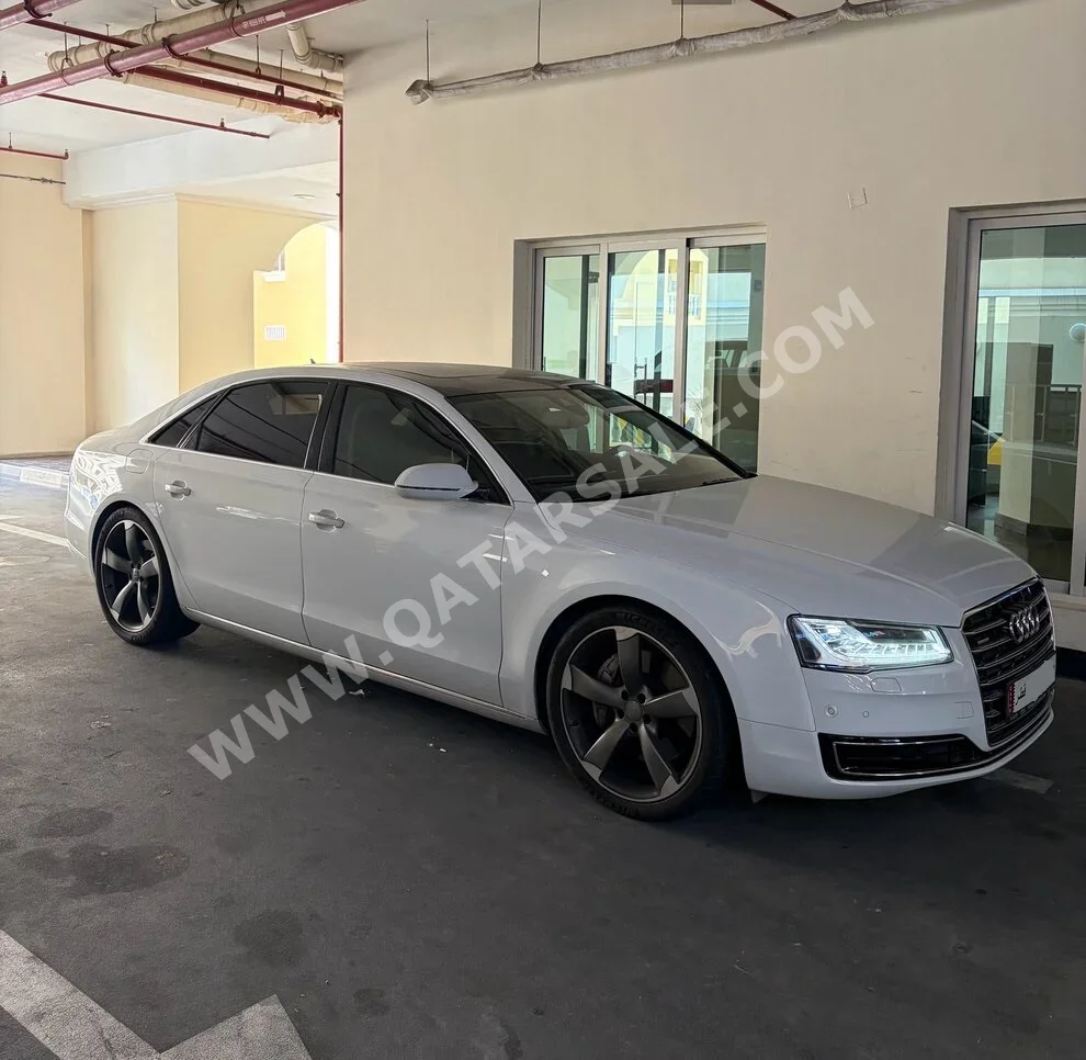 اودي  أي 8  أل  2015  اوتوماتيك  113,000 كم  8 سلندر  دفع كلي مستمر  سيدان  أبيض