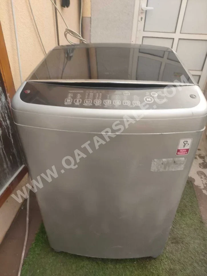 غسالة ملابس & الكل في واحد ال جي \  غسالة تحميل علوي  اللون الرمادي
