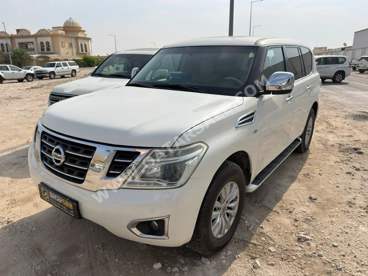 نيسان باترول اس اي 2015 اوتوماتيك 275,000 كم 8 سلندر دفع رباعي اس يو في أبيض