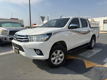 Toyota  Hilux  2019  Automatic  92,000 Km  4 Cylinder  Four Wheel Drive (4WD)  Pick Up  White