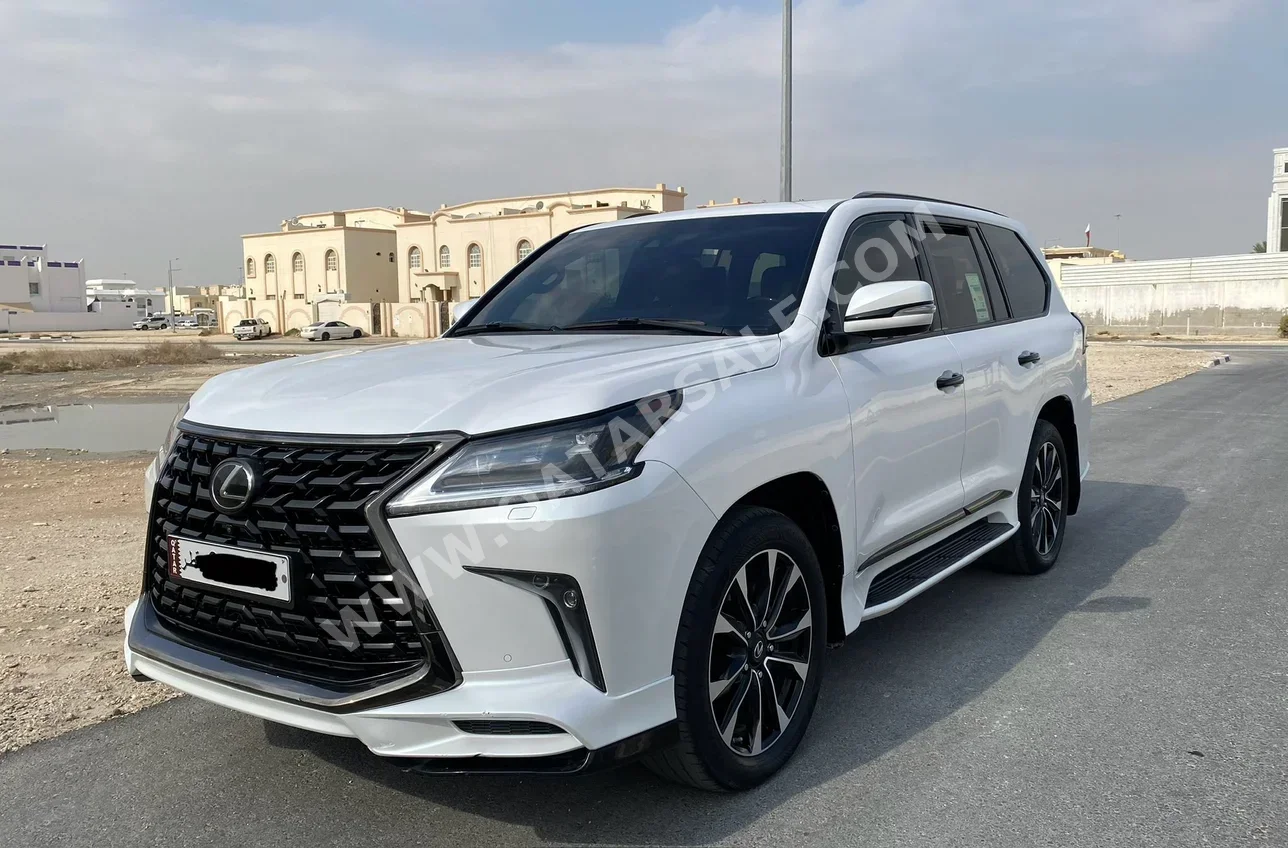 لكزس ال اكس 570 اس بلاك ايديشن 2021 اوتوماتيك 164,000 كم 8 سلندر دفع رباعي اس يو في أبيض