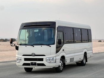 Toyota  Coaster  2022  Manual  279,000 Km  4 Cylinder  Rear Wheel Drive (RWD)  Van / Bus  White