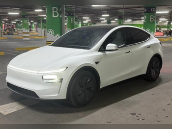 Tesla  Model Y  Long Range  2025  Automatic  13,000 Km  0 Cylinder  All Wheel Drive (AWD)  SUV  White  With Warranty