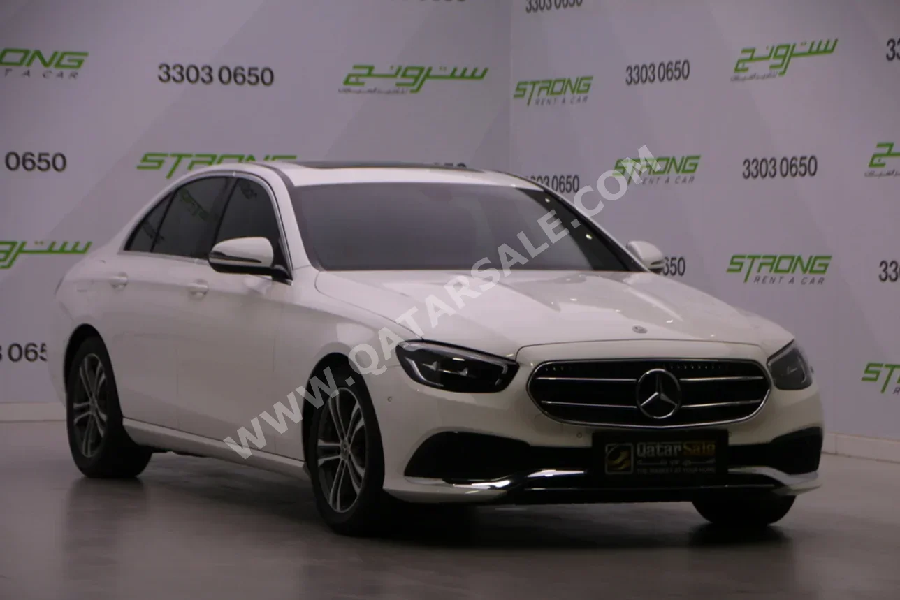 مرسيدس - بنز اي - كلاس 200 2022 اوتوماتيك 76,000 كم 4 سلندر دفع خلفي سيدان أبيض