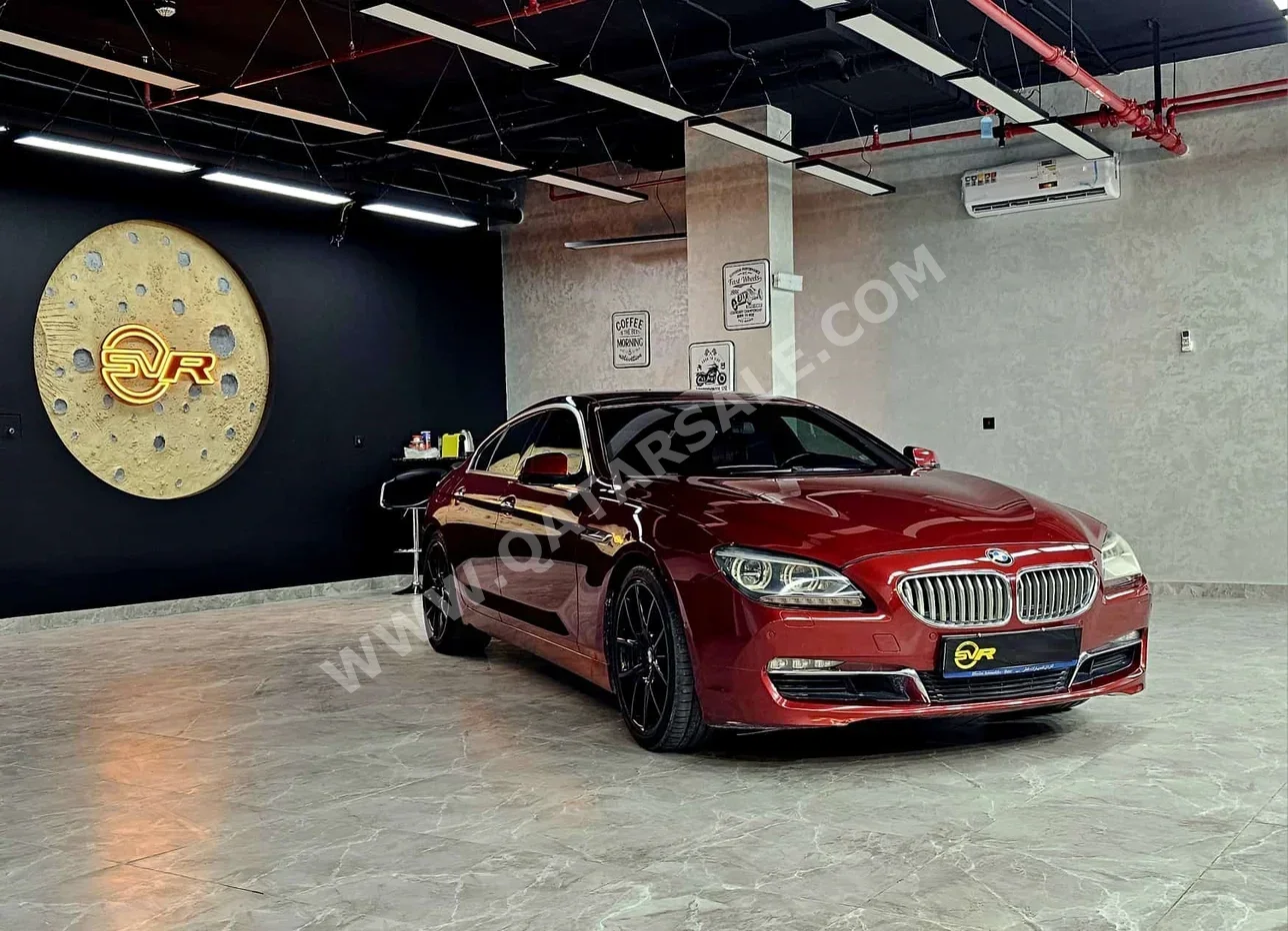 BMW  6-Series  650i  2013  Automatic  134,000 Km  8 Cylinder  Rear Wheel Drive (RWD)  Sedan  Maroon  With Warranty