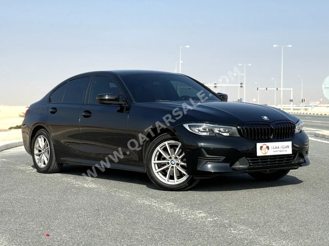 BMW  3-Series  320i  2022  Automatic  69,000 Km  4 Cylinder  Front Wheel Drive (FWD)  Sedan  Black  With Warranty