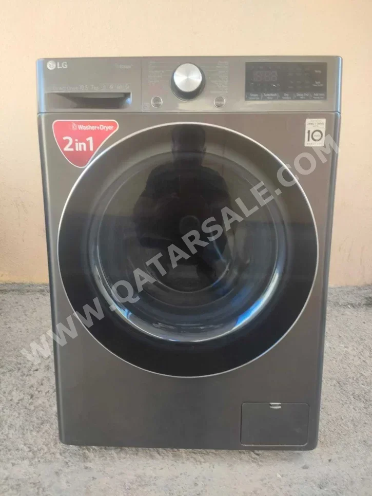 غسالة ملابس & الكل في واحد ال جي \  غسالة تحميل أمامي  فضة