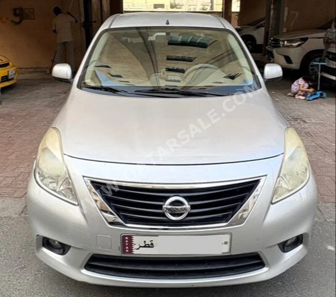 Nissan  Sunny  2013  Automatic  105,485 Km  4 Cylinder  Sedan  Silver