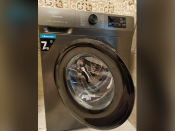 غسالة ملابس & الكل في واحد هاي سينس \  غسالة تحميل أمامي  بلاتين