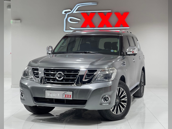 Nissan  Patrol  Platinum  2015  Automatic  208,000 Km  8 Cylinder  Four Wheel Drive (4WD)  SUV  Gray