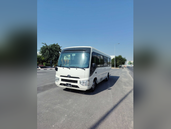 Toyota  Coaster  2022  Manual  241,000 Km  4 Cylinder  Rear Wheel Drive (RWD)  Van / Bus  White