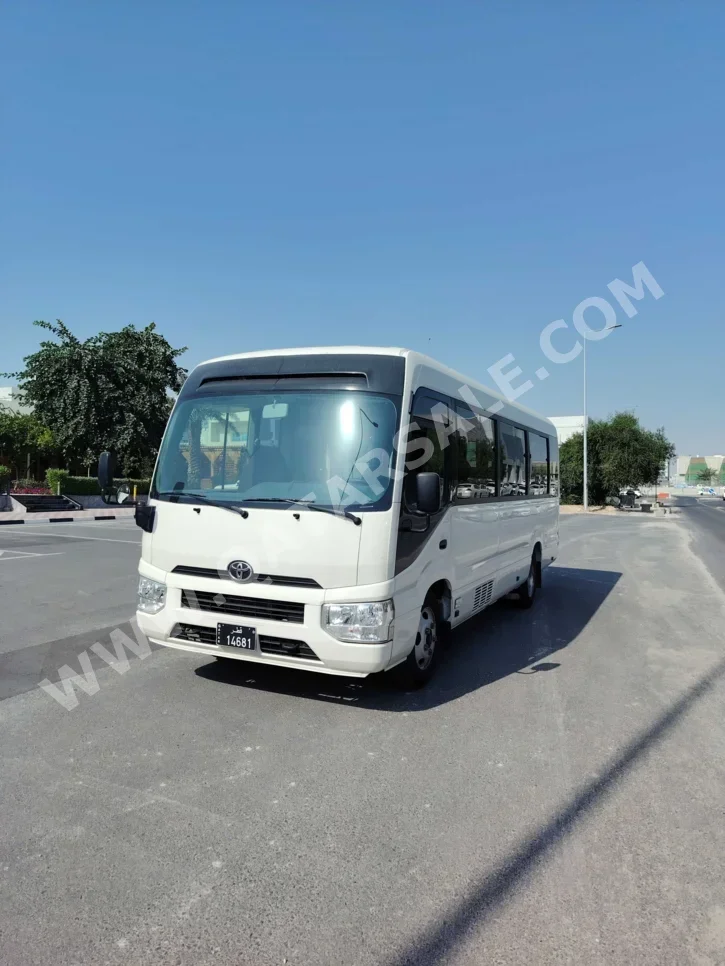 Toyota Coaster 2022 Manual 241,000 Km 4 Cylinder Rear Wheel Drive (RWD) Van / Bus White