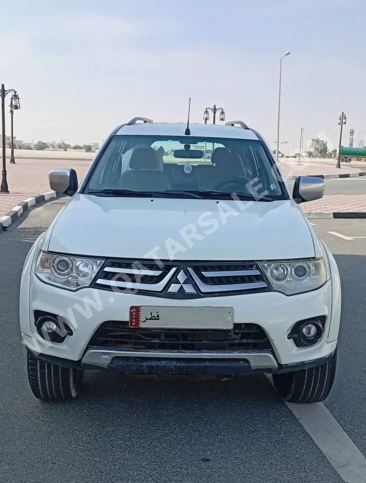 متسوبيشي  باجيرو  مونتيرو سبورت  2015  اوتوماتيك  350,000 كم  4 سلندر  دفع رباعي  اس يو في  أبيض