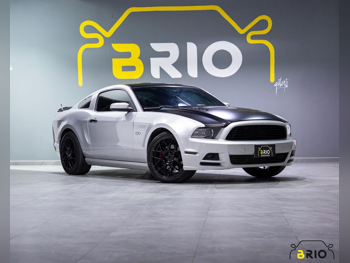 Ford  Mustang  GT  2014  Automatic  138,000 Km  8 Cylinder  Rear Wheel Drive (RWD)  Coupe / Sport  Silver